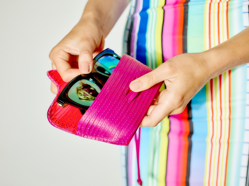 sony h.ear on pink headphones with sunglasses case