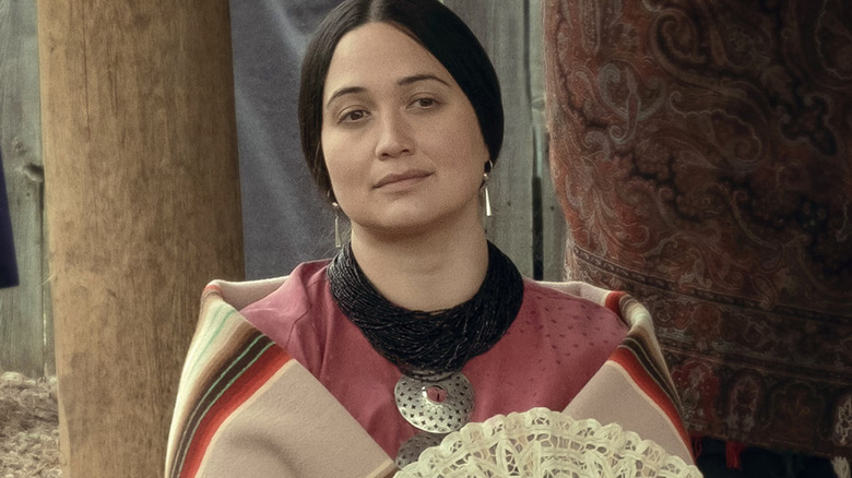 Mollie, arătând obosit beatific