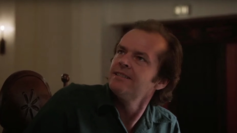 Jack Nicholson, Jack Torrance, ridică privirea furios de la mașina sa de scris în The Shining