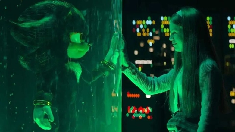 Shadow the Hedgehog și Maria ating mâinile în laborator în Sonic the Hedgehog 3