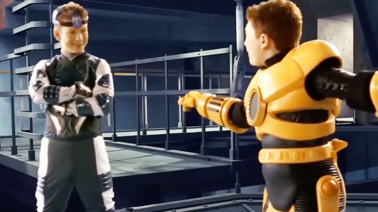 Băiatul cu degete lungi vorbește cu Juni în cadrul unei simulări pe computer în Spy Kids 3-D: Game Over