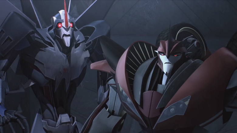 Transformers: Prime Starscream arăt speriat Knock Out arată enervat