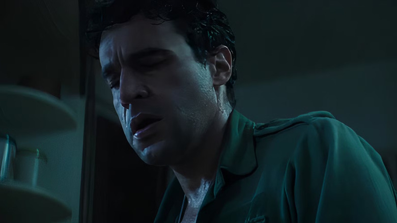 Blake, privind în jos la ceva, bănuind că ar putea fi un Om-Lup.