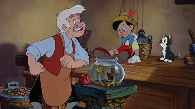 Geppetto îl admiră pe Pinocchio în Pinocchio (1940)
