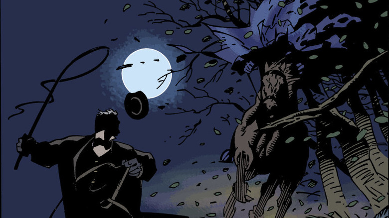 Batman alungând un criminal pe cal în Gotham de Gaslight