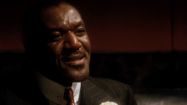 Delroy Lindo pare dapper ca vestul Indian Archie în Malcolm X