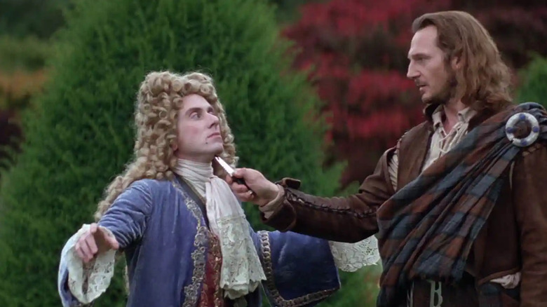 Rob Roy ținând un cuțit la gâtul lui Cunningham în Rob Roy