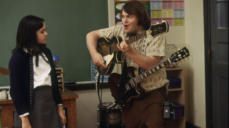 Jack Black ca Dewey Finn care predă chitara în 