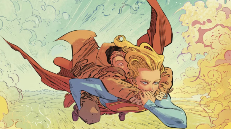 Supergirl zburând cu Ruthye Knoll pe spatele ei în Supergirl: Woman of Tomorrow