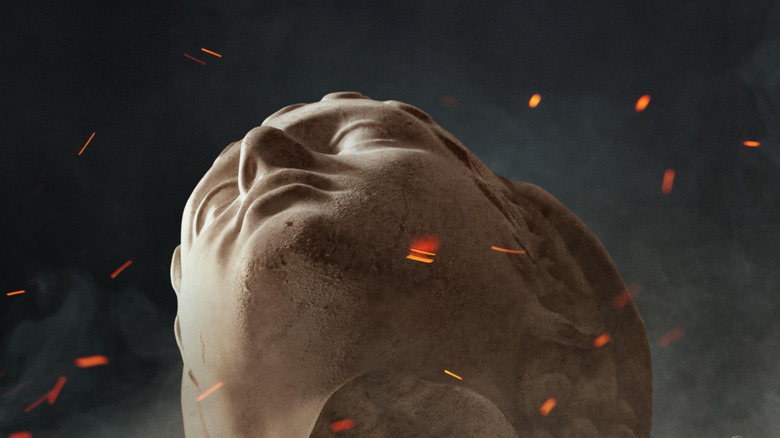 Statuia cu cenușă fierbinte care plutește în jurul capului pe afiș pentru The Odyssey (2026) de Christopher Nolan (2026)