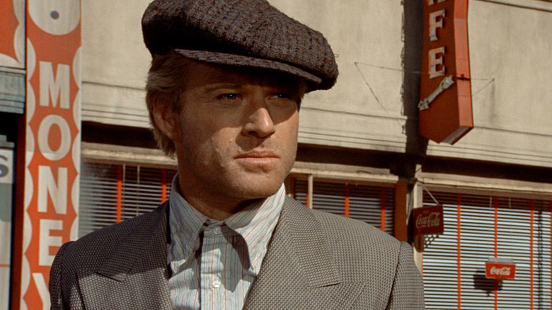 Robert Redford arată pupa ca Johnny Hooker în Sting