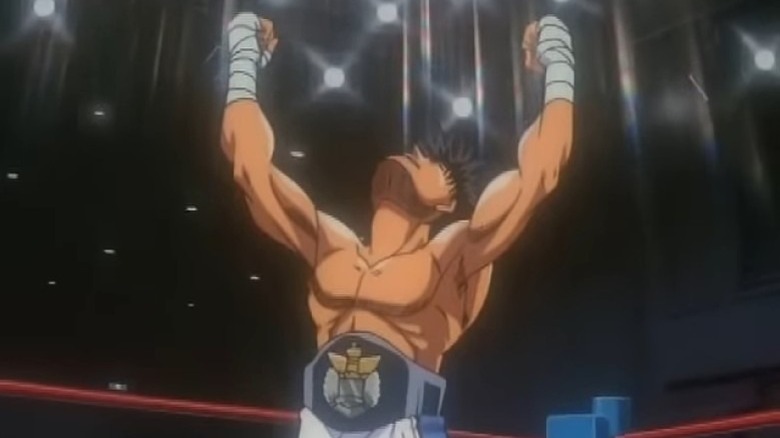 IPPO își ridică mâinile sărbătorind devenind campion în Hajime no Ippo