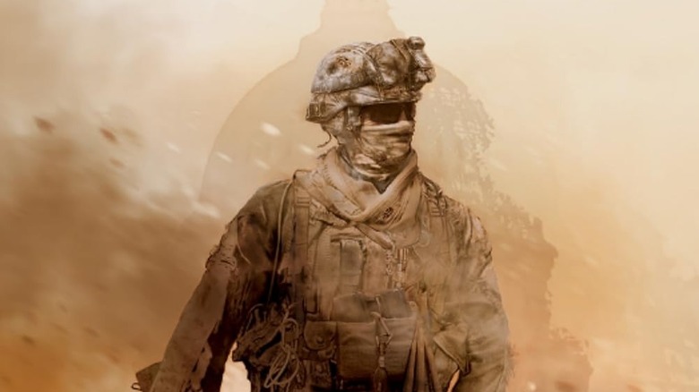 Un soldat care se îndepărtează de dărâmături pe copertă pentru Call of Duty: Modern Warfare 2