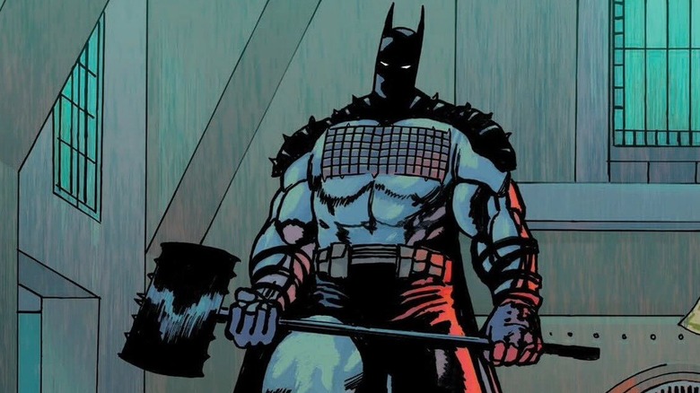 Absolute Batman Ark M Special - Batman, ținând toporul, oprind un jaf de bancă