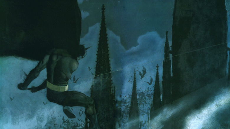 Batman se leagănă peste orizontul Gotham într-un panou din Batman Night Cries