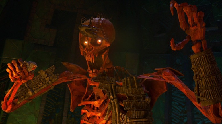 Un schelet uriaș cu Maimuța în pumn în Kubo și cele două șiruri