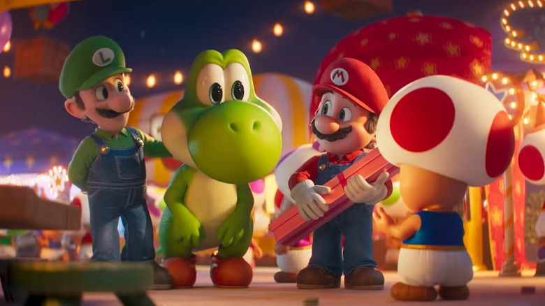 Luigi, Yoshi, Mario și Toad la petrecerea lui Peach în filmul The Super Mario Galaxy