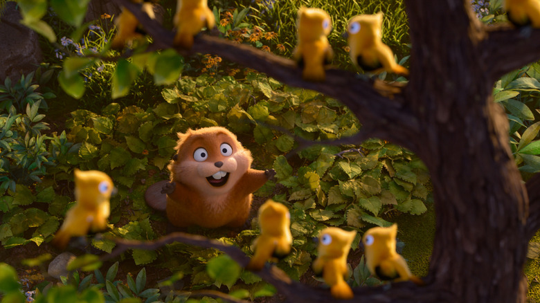 Mabel (ca un castor) vorbind cu un grup de păsări galbene din Hoppers