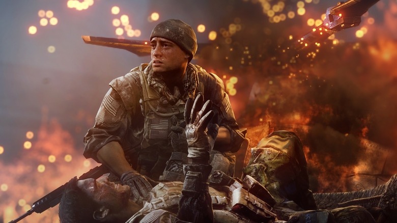 Doi soldați americani prinși în mijlocul unei explozii de la jocurile video Battlefield