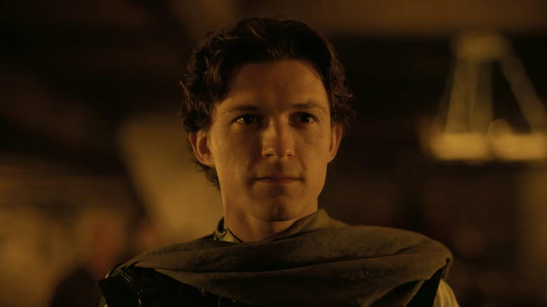 Telemachus stând într-o sală de mese în Odiseea (2026)