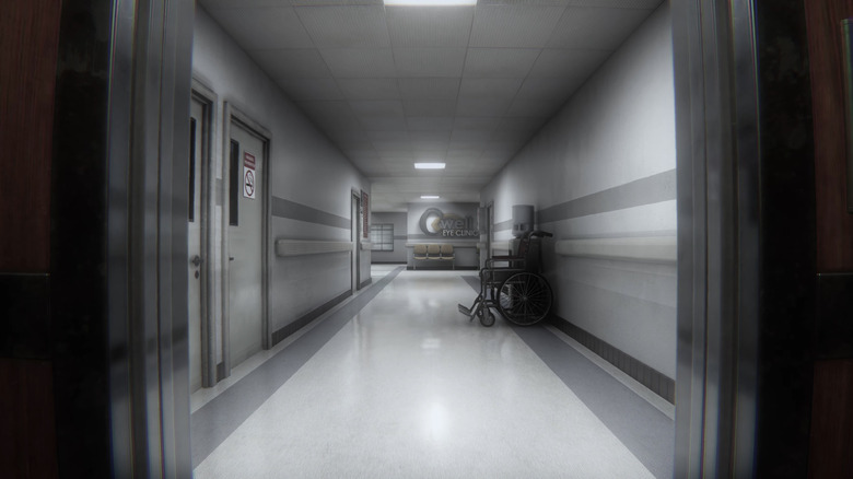 Un coridor dintr-o unitate de examinare a ochilor este văzut din interiorul unui lift în Farsight