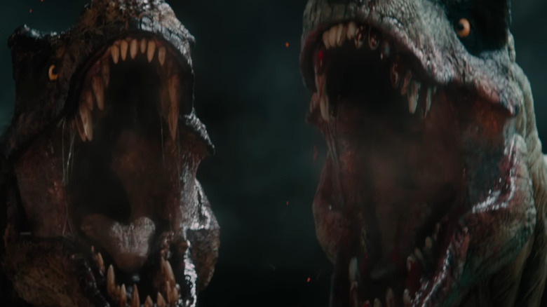 Doi T-rex urlând unul lângă altul în Primitive War