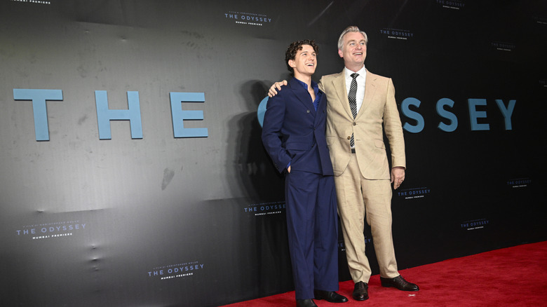 Tom Holland și Christopher Nolan pe covorul roșu pentru The Odyssey