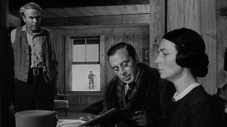 Agnes Moorehead ca Mary Kane, Harry Shannon ca Jim Kane și George Coulouris ca Walter Parks Thatcher renunță la viitorul lui Charles Foster Kane în Citizen Kane