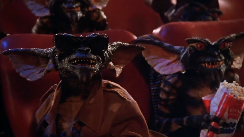 Gremlins - Gremins care se uită la un film și mănâncă floricele