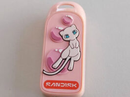 Sandisk Pokémon Portable SSD in Mewtwo edition next to the Mew-themed USB-C flash drive