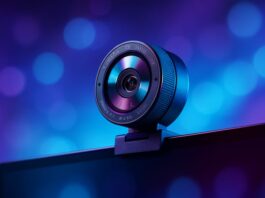 Razer Kiyo V2 Pro webcam mounted on a monitor showing its wide-angle lens and privacy shutter