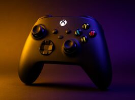 Xbox PC app Garrison redesign shown on a Windows laptop screen