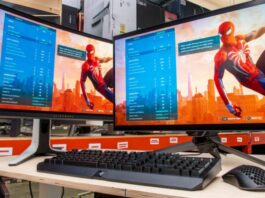 A competitive FPS gamer sitting in front of a high refresh rate gaming monitor