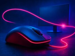 Gamer using a mouse and keyboard in front of a monitor to reduce input lag while gaming
