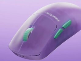 Keychron G6 HE wireless gaming mouse shown in a translucent colourway on a desk